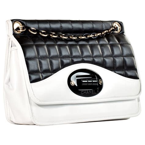 chanel black and white flap bag|Black Chanel leather shoulder bag.